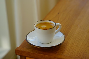 A cup of warm espresso coffee