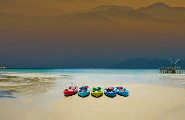 landscape boat on the beach with mountains background - 326976340