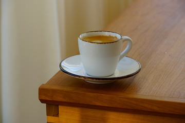 A cup of warm espresso coffee