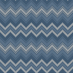 Knitted zigzag pattern. Seamless knit chevron horizontal stripes in grey blue and white for Christmas and New Year jumper, sweater, socks, wrapping paper, or other modern fabric design.