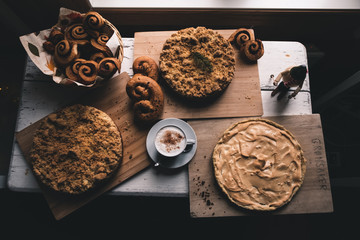 home made pastry during quarantine in 2020. Pastries picture with soft light. perfect patry picture for magazines. cakes and cup of coffee. perfect for home quarantine 