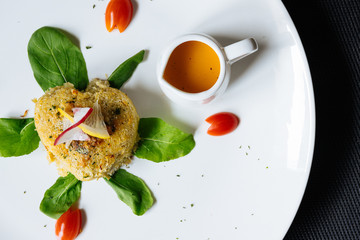 Top view of organic fresh homemade crab cakes with lemon and tartar sauce. With copy space for your text. Italian food ingredients concept.