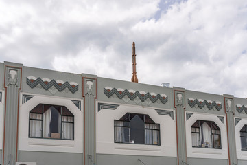 decorated frieze on picturesque 30's Deco building cornice, Napier, New Zealand