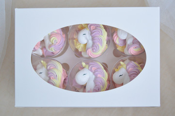 Multycolored candy unicorn meringue for birthday party