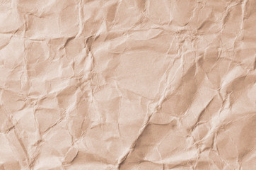 Creative background with scattered overlay of crumpled white paper.