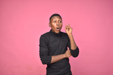 young black man having thoughts, thinking about something, has an exciting idea