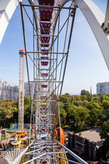 Metal construction of ferris wheel, view from inside.