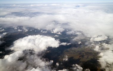 Beautiful large clouds over the rustic scenery.