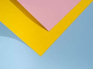 Pink and yellow polygon paper design