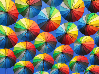 Fototapeta na wymiar Colorful umbrellas in the sky.