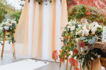 Wedding ceremony in Boho style. Decor and floristry
