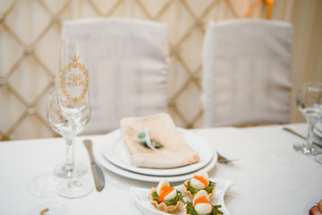 wedding glasses on the brides table