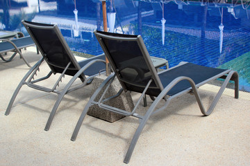 Lounge chairs by the poolside