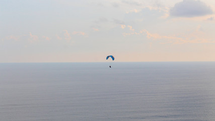 extreme paragliding sports are above the clouds