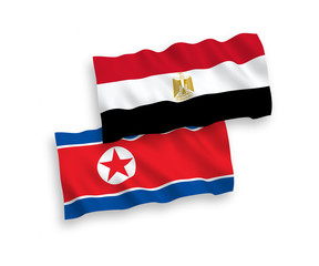 Flags of North Korea and Egypt on a white background
