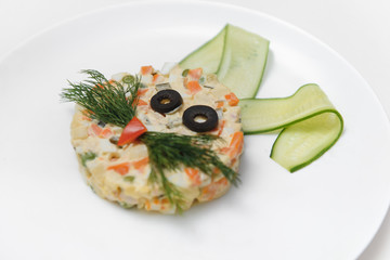 baby salad laid out in the form of a bunny on the plate
