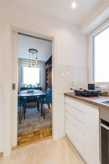 Small kitchen interior with a view to a dining room