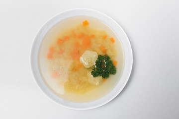 Bean soup with meatballs, vegetables and dill