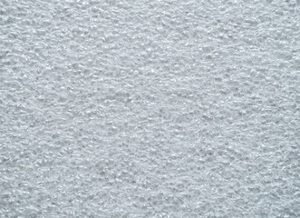 A dimpled white structure. Background of foamed polyethylene.