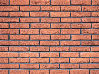 Obraz premium Old brick wall, old texture of red stone blocks closeup