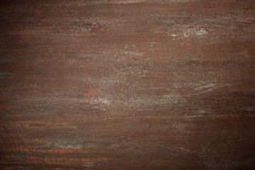 Brown abstract background with rough texture. The texture of the copper background is covered with a patina