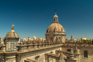 Obraz premium The dome of the Cathedral and the bright blue sky. View from the bell tower. Jerez de la Frontera, Andalusia, Spain.