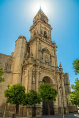 Fototapeta na wymiar The main facade of the church of San Miguel against the sun. Jerez de la Frontera, Andalusia, Spain