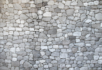 Real stone wall surface texture background.