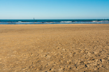 Valencia Beach (Malvarrosa) with blue sky and sand