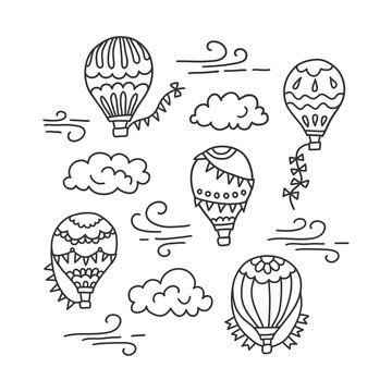 Hot air balloon and clouds. Vector hand drawn doodle illustration isolated on white background