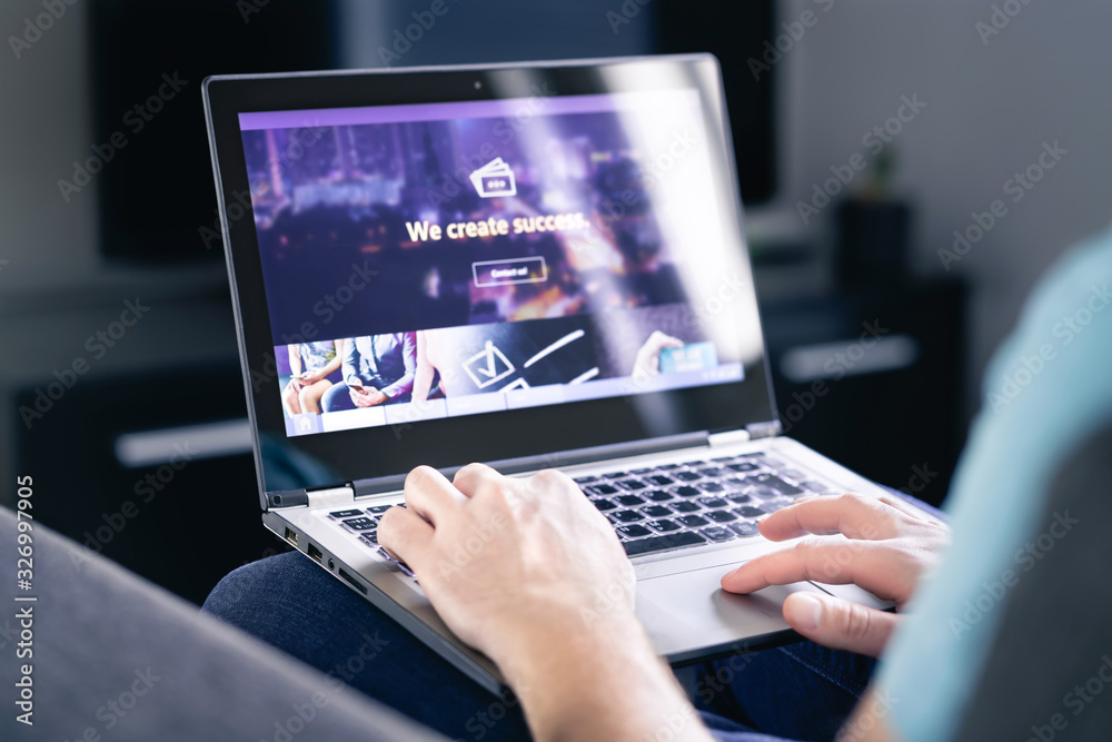 Wall mural website graphic design. web designer, developer or programmer working on a responsive www site inter