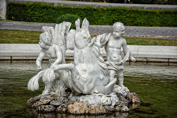 Statue in fountain in Belvedere Park, Vienna, Austria