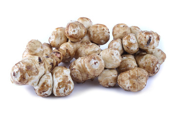 Jerusalem artichokes isolated on white