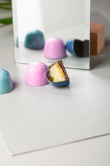 half of chocolate candy and mirror