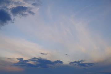 Fototapeta na wymiar Clouds sunset sky blue glow