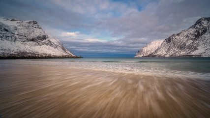 Gulf, bay, Sand beach with a huge surf in Ersfjord in sunset