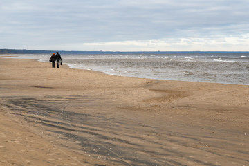 Gulf of Riga, Jurmala region, Latvia. Walking along the empty beach.