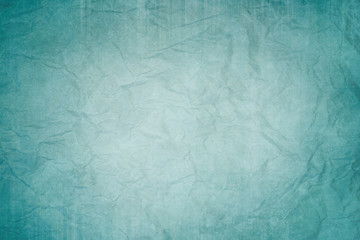 blue wrinkled sheet of paper