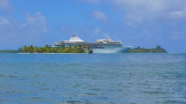 Small Tropical Island With A Cruise Ship, South Pacific Ocean, French Polynesia, Huahine