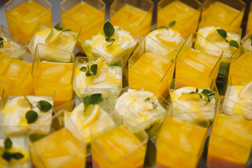 Delicious sweets on wedding candy buffet with desserts, cupcakes,tiramisu and cookies