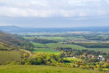 Obraz premium View of green fields of Sussex from Devils Dyke, Ditchling Beacon, United Kingdom