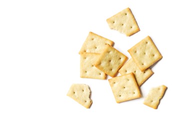 Crispy salty cracker on a white background. Flat lay food photography