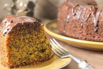 Cake with poppy seeds sprinkled with chocolate.