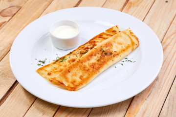 stuffed pancakes with sour cream