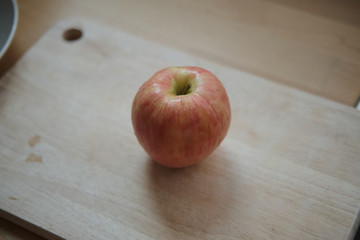 fresh apple on the wood plate