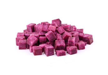 Purple potatoes cut in square , isolated on a white background
