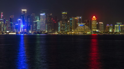 Doha skyscrapers in downtown skyline night timelapse, Qatar, Middle East
