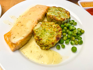 Salmon Fillet , vegetable medallion and lemon dill sauce