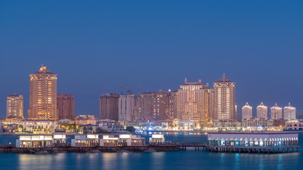 Fototapeta na wymiar View from Katara Beach day to night timelapse in Doha, Qatar, towards the Pearl