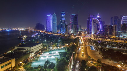 Obraz na płótnie Canvas The skyline of the West Bay area from top in Doha timelapse, Qatar.